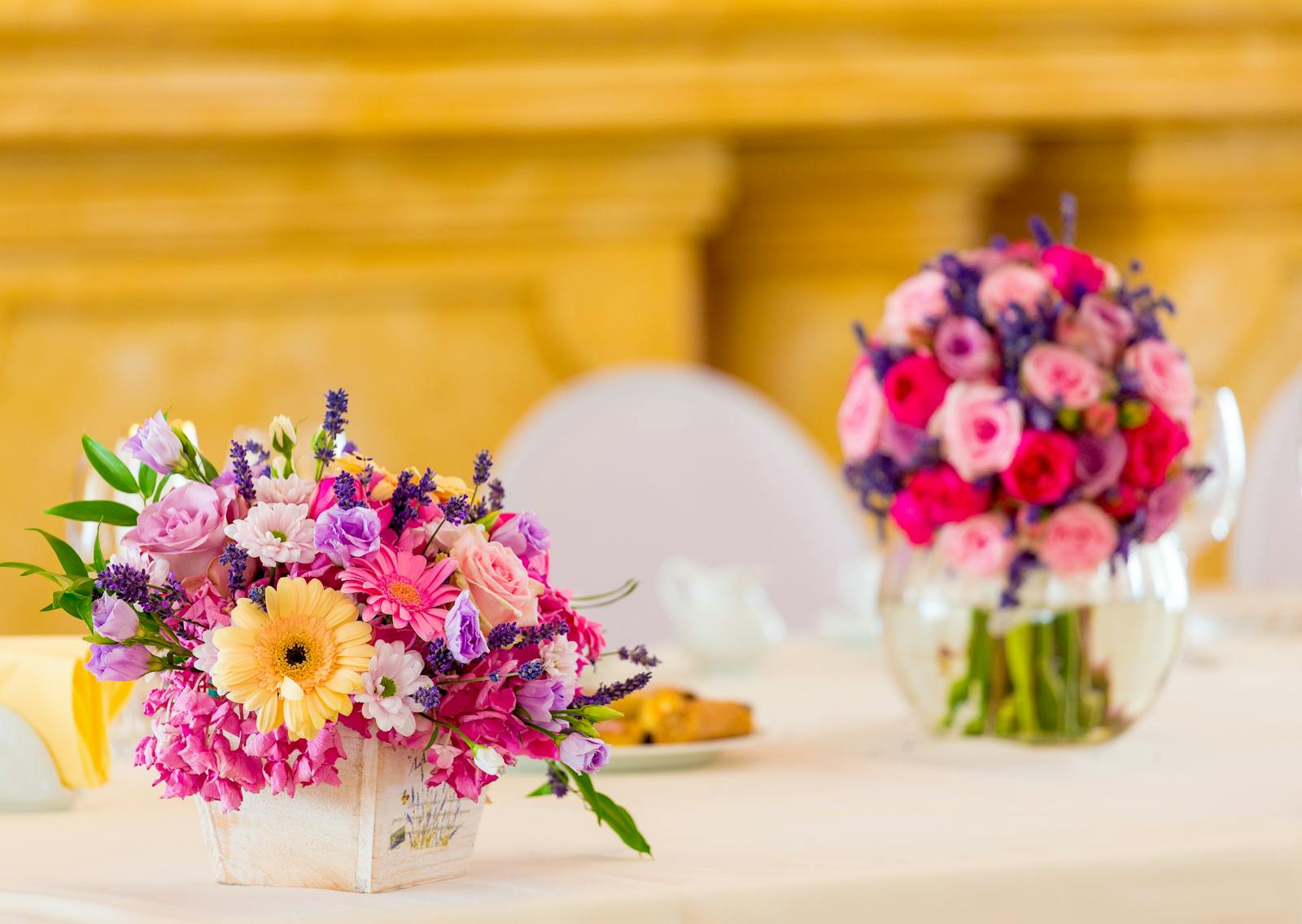 Assorted-color Flowers on White Ceramic Vase